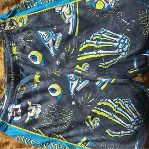 Nike Skateboarding Shorts with Blue and Yellow Graphics
